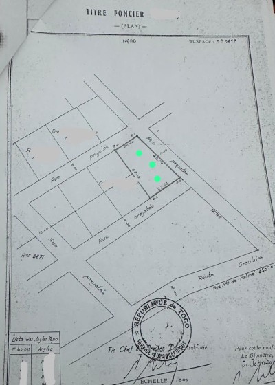 1 lot 3/4 avec titre foncier  à 600m du goudron