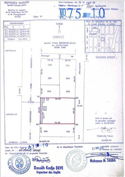 1 lot 3/4 cloturé avec titre foncier au bord du goudron