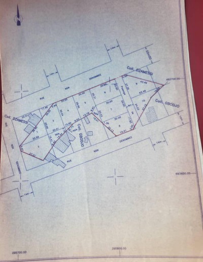 14 lots collés avec titre foncier en cours à 300m du goudron