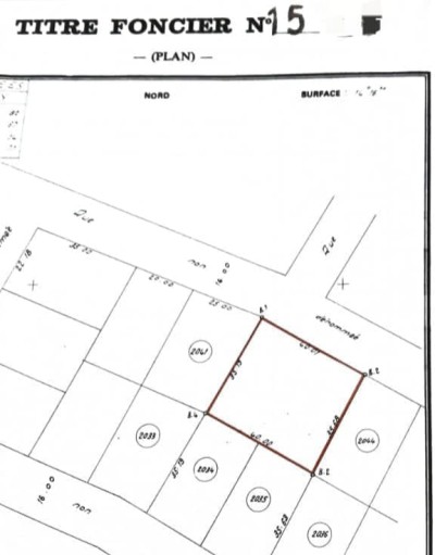 2 lots collés cloturés avec titre foncier à 200m du goudron