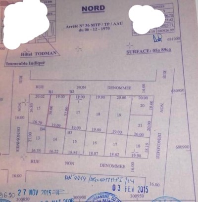 1 lot avec titre foncier global à 80m du goudron