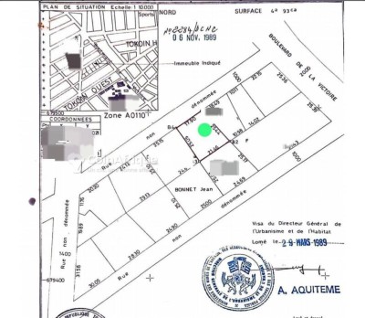 1 lot cloturé avec titre foncier à 40m du goudron