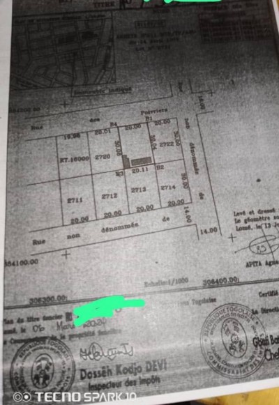 1 lot cloturé avec titre foncier à 500m du goudron