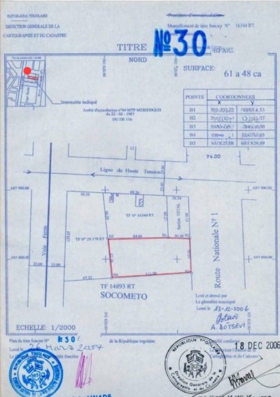 10 lots collés cloturés avec titre foncier au bord du goudron
