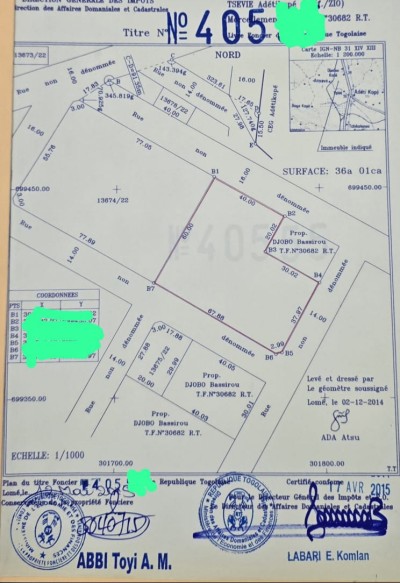 6 lots collés cloturés avec titre foncier à 880m du goudron