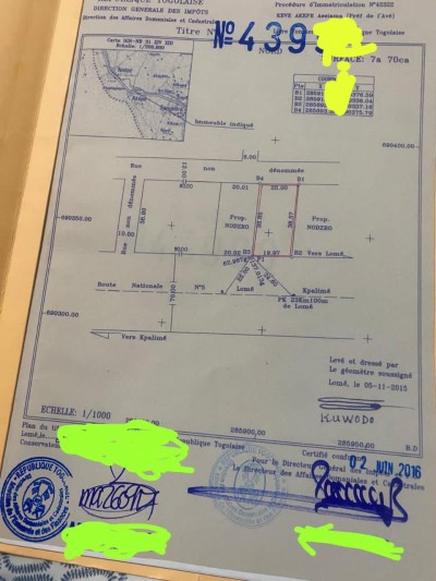 1 lot 1/4 avec titre foncier au bord du goudron