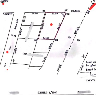 1 lot 3/4 cloturé avec titre foncier au bord du goudron