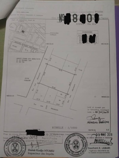 4 lots collés cloturés avec titre foncier à 200m du goudron