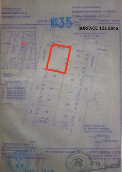 2 lots collés cloturés avec titre foncier à 100m du goudron