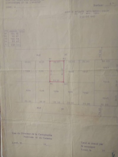 1 lot cloturé avec titre foncier à 300m du goudron bati
