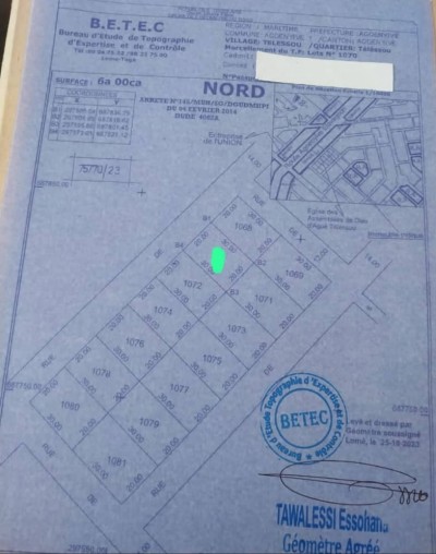 1 lot cloturé avec titre foncier en cours à 300m du goudron