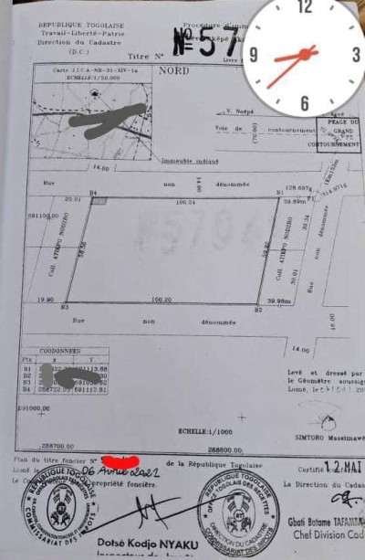 10 lots collés avec titre foncier à 1km du goudron