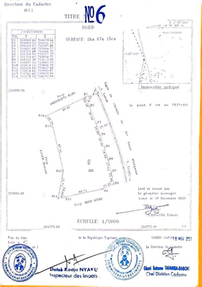 28 lots cloturés avec titre foncier au bord du goudron