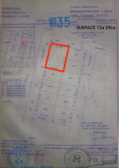 2 lots cloturés avec titre foncier à 100m du goudron