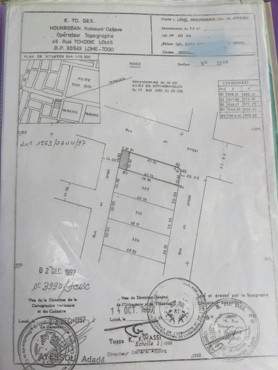 1 lot avec titre foncier en cours au bord du goudron
