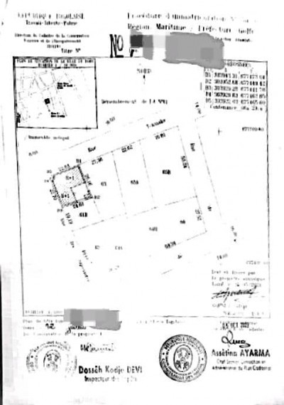 1 lot cloturé avec titre foncier au grand marché assigamé