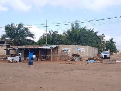 1 lot cloturé avec titre foncier à 500m du carrefour zossimé