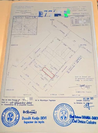 démi lot cloturé avec titre foncier à 50m du goudron