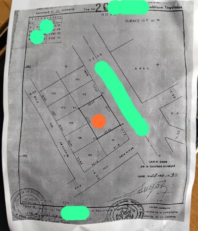 2 lots cloturés avec titre foncier à 80m du goudron