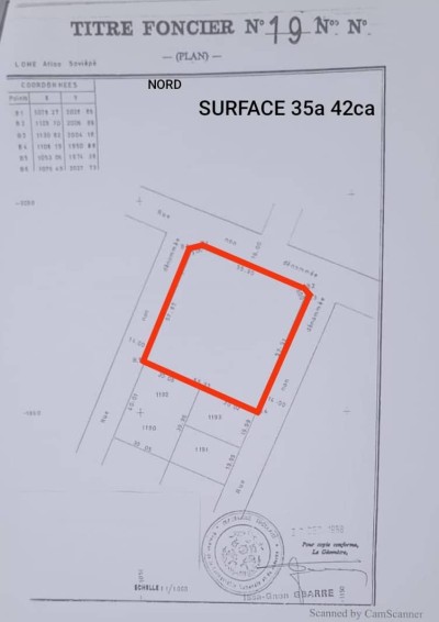 6 lots collés cloturés avec titre foncier  à 300m du goudron