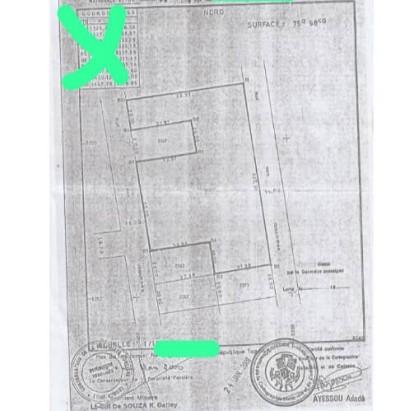 12 lots collés cloturés avec titre foncier à 100m du goudron