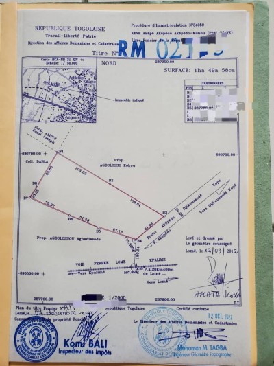 1 hectare 49a ( 13 lots ) avec titre foncier à 180m du goudron