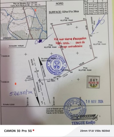 2 hectares collés avec titre foncier global à 1.2km du goudron